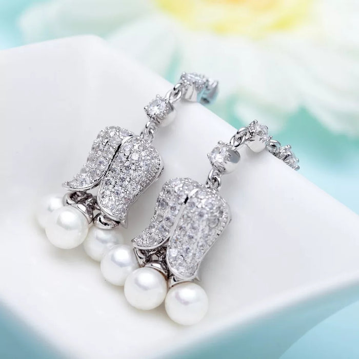 Brilliant Tulip Design Drop Earrings for Women: 18k White Gold Plated with Clear White Cubic Zirconia & Simulated Pearl Tassel