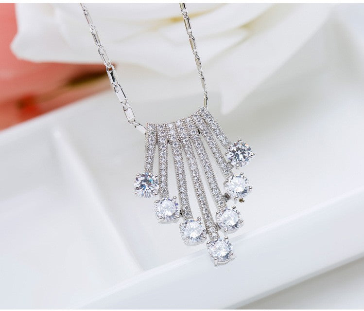 18k White Gold Plated Cubic Zirconia Geometric Flower Pendant Necklace with Tassel for Women