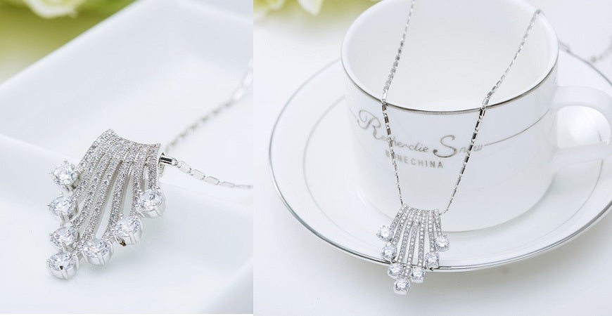 18k White Gold Plated Cubic Zirconia Geometric Flower Pendant Necklace with Tassel for Women