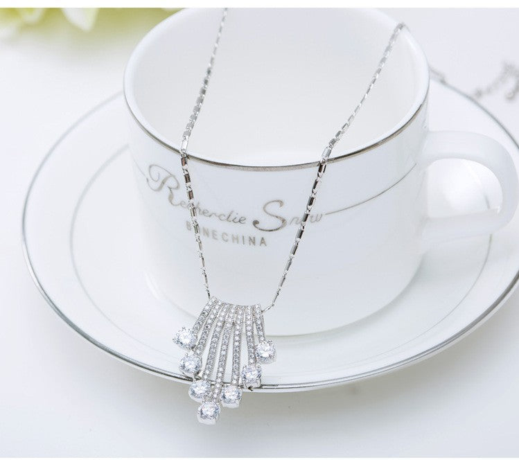 18k White Gold Plated Cubic Zirconia Geometric Flower Pendant Necklace with Tassel for Women