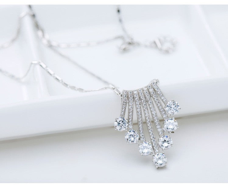 18k White Gold Plated Cubic Zirconia Geometric Flower Pendant Necklace with Tassel for Women